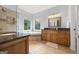 Luxurious bathroom with a large tub, shower, and double vanity with granite countertops at 3924 Lorien Nw Way, Kennesaw, GA 30152