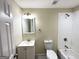 Full bathroom features a tiled shower, vanity, and a large mirror at 4366 Glenwood Pkwy, Decatur, GA 30032