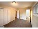 Bedroom with closet doors and ensuite bathroom at 4366 Glenwood Pkwy, Decatur, GA 30032