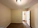 Bedroom featuring tan walls, carpet, and a standard window at 4366 Glenwood Pkwy, Decatur, GA 30032