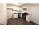 Bright kitchen featuring stainless steel appliances, granite countertops, and white cabinets at 4366 Glenwood Pkwy, Decatur, GA 30032