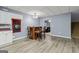 Basement bar with seating and sports themed decor, great for entertaining at 3823 Heritage Pl, Buford, GA 30519