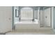 Bathroom with bathtub, shower, and tiled floor bathed in natural light from a window at 3823 Heritage Pl, Buford, GA 30519