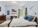 Comfortable bedroom with golf decor, providing a relaxing personal space at 3823 Heritage Pl, Buford, GA 30519