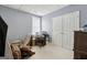 This bedroom features a large closet and a cozy window for natural light at 3823 Heritage Pl, Buford, GA 30519
