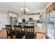 Open kitchen with dining area and stainless steel appliances at 3823 Heritage Pl, Buford, GA 30519