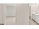 Hallway view with a bedroom to the left and a bathroom to the right at 1940 Van Allen Ct # 12, Dacula, GA 30019