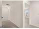 Bright hallway featuring neutral walls and plush carpeting leading into other rooms at 1940 Van Allen Ct # 12, Dacula, GA 30019