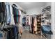 Spacious walk-in closet with ample storage and organization features, perfect for maximizing space and keeping belongings tidy at 226 Le Paradis Blvd, Sharpsburg, GA 30277