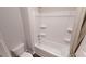Clean and functional bathroom features a shower-tub combo and a standard white toilet at 1278 Hollingsworth Way # 39, Dacula, GA 30019