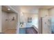 Bright bathroom featuring double sinks, a bathtub, and separate glass-enclosed shower at 1278 Hollingsworth Way # 39, Dacula, GA 30019
