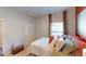Cozy bedroom with a queen-sized bed, neutral carpet, and ample natural light at 1278 Hollingsworth Way # 39, Dacula, GA 30019