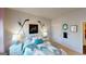 Inviting bedroom featuring playful decor and matching nightstands with stylish lamps at 1278 Hollingsworth Way # 39, Dacula, GA 30019