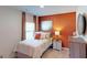 Cozy bedroom with a queen-sized bed, neutral carpet, and ample natural light at 1278 Hollingsworth Way # 39, Dacula, GA 30019