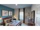 Stylish bedroom displaying a Queen bed with decorative pillows and ample natural light at 1278 Hollingsworth Way # 39, Dacula, GA 30019