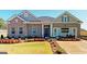 Charming single-story home with brick and siding, professional landscaping, and a welcoming front entrance at 1278 Hollingsworth Way # 39, Dacula, GA 30019