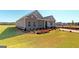 New construction home boasting manicured lawn and appealing landscaping at 1278 Hollingsworth Way # 39, Dacula, GA 30019