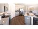 Contemporary kitchen with stainless steel appliances, granite counters, island, and seating at 1278 Hollingsworth Way # 39, Dacula, GA 30019