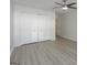 Bedroom featuring ceiling fan, closet with louvered doors, and neutral walls at 701 Ridgelake Dr, Peachtree City, GA 30269