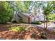 Charming townhome showcasing a well-manicured lawn and inviting facade nestled in a tranquil neighborhood at 701 Ridgelake Dr, Peachtree City, GA 30269