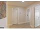 Hallway with wood look floors, closet doors and recessed lighting at 701 Ridgelake Dr, Peachtree City, GA 30269