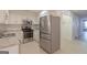 Modern kitchen featuring stainless steel appliances, granite countertops and subway tile backsplash at 701 Ridgelake Dr, Peachtree City, GA 30269