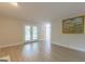 Living room featuring access to the patio doors and fresh neutral paint at 701 Ridgelake Dr, Peachtree City, GA 30269