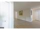 Spacious living room featuring sleek floors and freshly painted white walls at 701 Ridgelake Dr, Peachtree City, GA 30269
