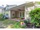 Covered patio with view of the backyard with outdoor seating at 701 Ridgelake Dr, Peachtree City, GA 30269