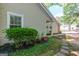 Landscaped side yard with a view of the exterior siding at 701 Ridgelake Dr, Peachtree City, GA 30269