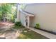 Charming townhouse exterior with a welcoming entrance, stone walkway, and well-maintained landscaping at 701 Ridgelake Dr, Peachtree City, GA 30269