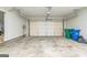 Spacious two-car garage with concrete floor and white walls at 1106 Bakary Ct, Decatur, GA 30032