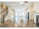 Open floorplan featuring hardwood floors connecting the living room, kitchen, and dining area perfect for modern living at 1106 Bakary Ct, Decatur, GA 30032
