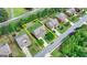 Aerial view of home showcasing landscaping, curb appeal, and a neatly kept lawn within a yellow border at 1370 Sunnys Halo Dr, Suwanee, GA 30024