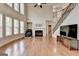 Spacious living room with fireplace and abundant natural light at 1370 Sunnys Halo Dr, Suwanee, GA 30024