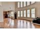 Open living space with high ceilings and hardwood floors at 1370 Sunnys Halo Dr, Suwanee, GA 30024