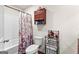 Bathroom showcasing a tub/shower combination and a vanity with convenient storage at 1003 Nandina Ct, Villa Rica, GA 30180