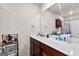 Clean bathroom offers a large mirror, spacious vanity, and storage at 1003 Nandina Ct, Villa Rica, GA 30180