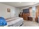 Cozy bedroom with a closet, window, and media center, offering comfort and functionality at 1003 Nandina Ct, Villa Rica, GA 30180