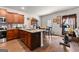 Well-equipped kitchen featuring an island, stainless steel appliances, and a dining area at 1003 Nandina Ct, Villa Rica, GA 30180