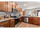 Well-equipped kitchen boasts stainless steel appliances and granite countertops at 1003 Nandina Ct, Villa Rica, GA 30180