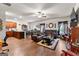 Spacious living room featuring wood flooring, comfortable seating, and ample natural light at 1003 Nandina Ct, Villa Rica, GA 30180