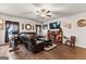 Inviting living area with wood floors, neutral walls, ceiling fan and natural light at 1003 Nandina Ct, Villa Rica, GA 30180