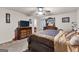 Relaxing main bedroom with a ceiling fan and coordinating furnishings at 1003 Nandina Ct, Villa Rica, GA 30180