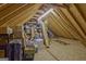 Attic room with exposed wooden rafters offering ample storage space at 229 Terrane Rdg, Peachtree City, GA 30269