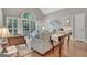 Inviting living room with hardwood floors, large windows, and stylish decor at 229 Terrane Rdg, Peachtree City, GA 30269