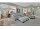 Open-concept living room with a view into the kitchen and ample natural light at 229 Terrane Rdg, Peachtree City, GA 30269