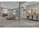 Bright and airy open-concept living space featuring a fireplace, dining area, and neutral decor at 229 Terrane Rdg, Peachtree City, GA 30269