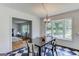 Eat-in kitchen with bay window and checkerboard tile floor at 2942 Old Norcross Rd, Tucker, GA 30084