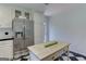 Bright kitchen with island and stainless refrigerator at 2942 Old Norcross Rd, Tucker, GA 30084